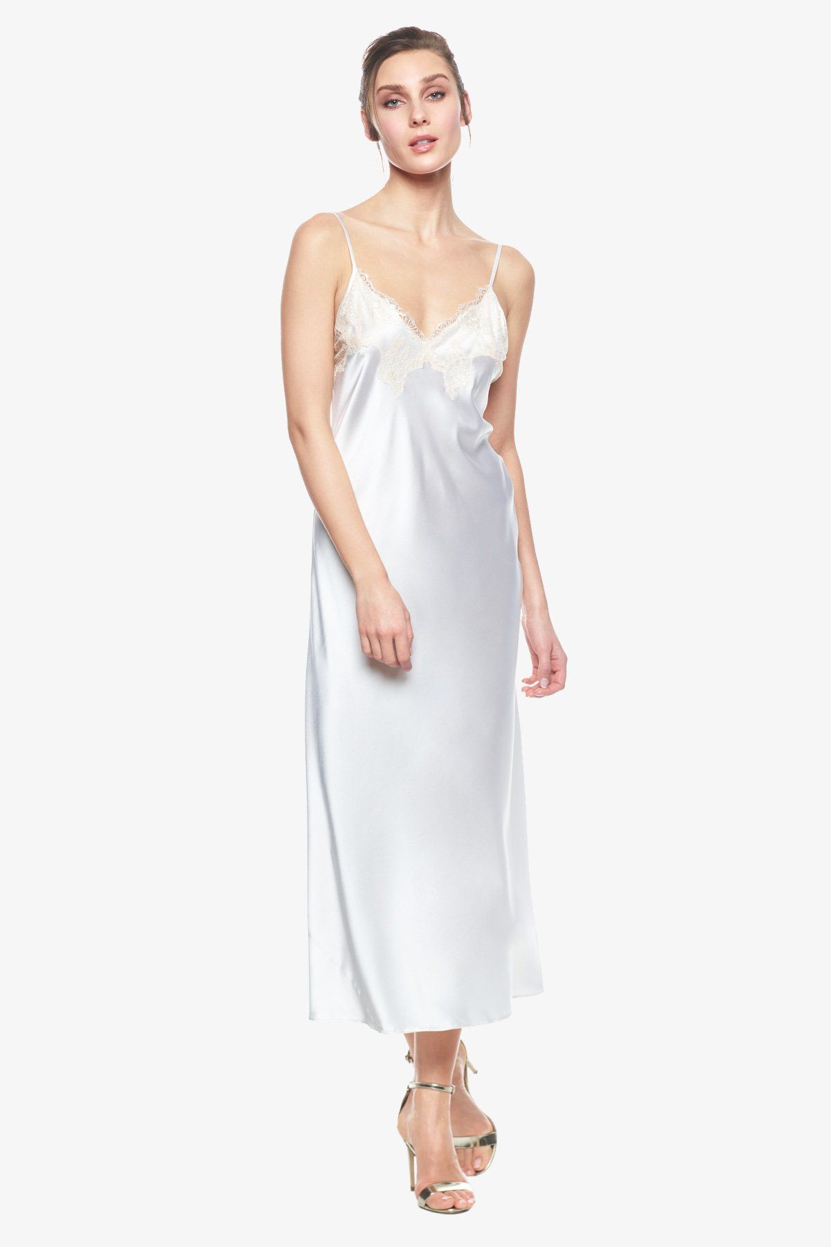 Model showcasing Cordelia silk bridal gown in pearl-white