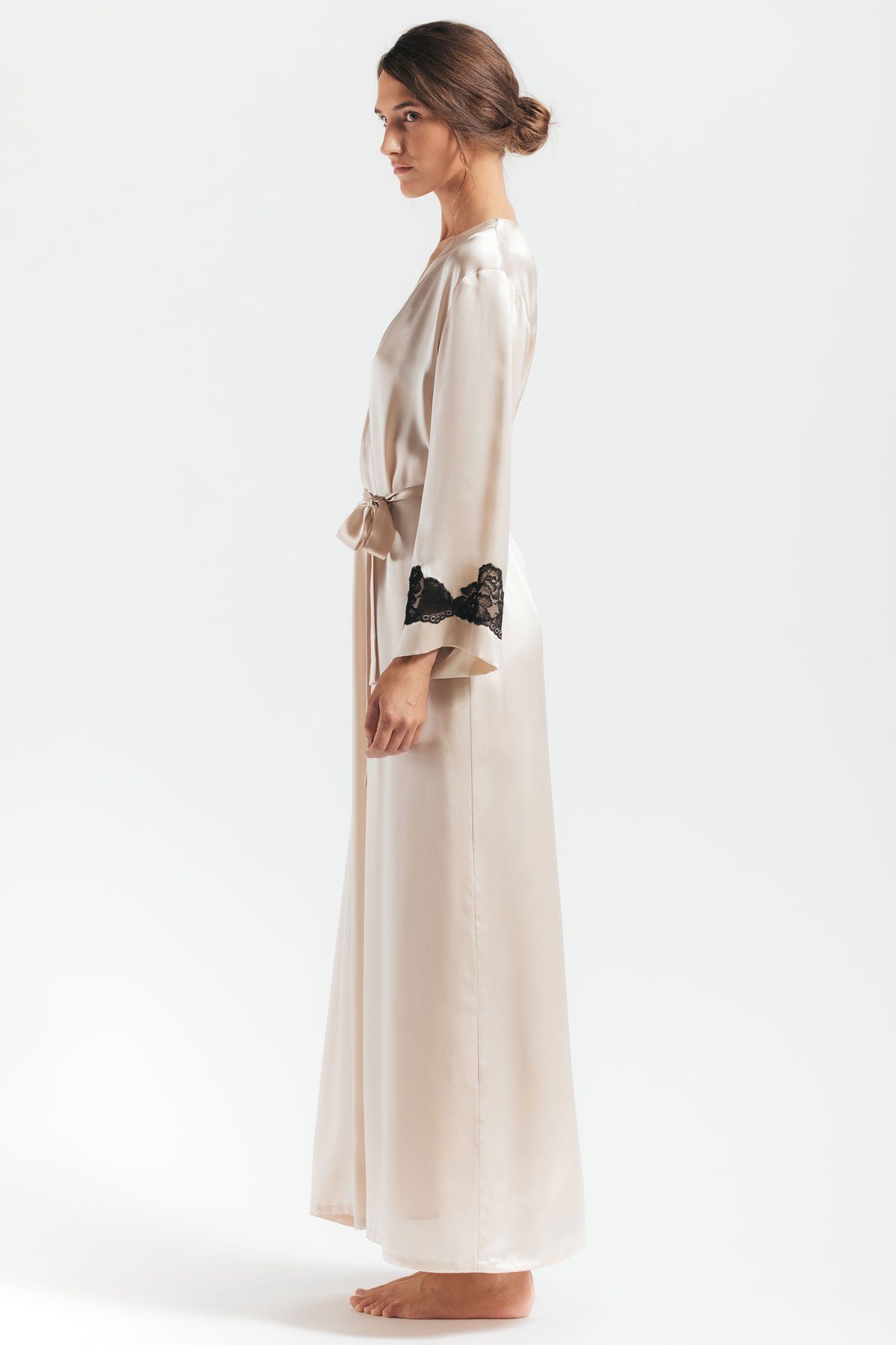 Sideview of model wearing  Morgan Long silk robe in champagne