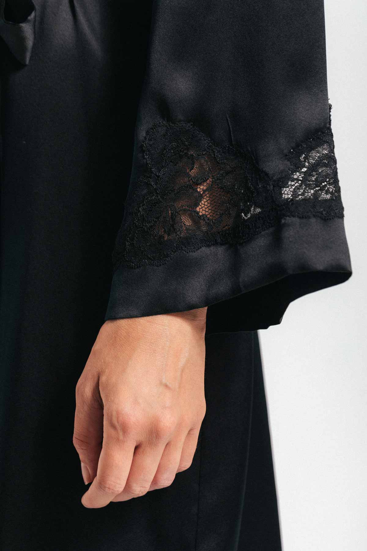 Close up of lace sleeve on Morgan Long black silk robe