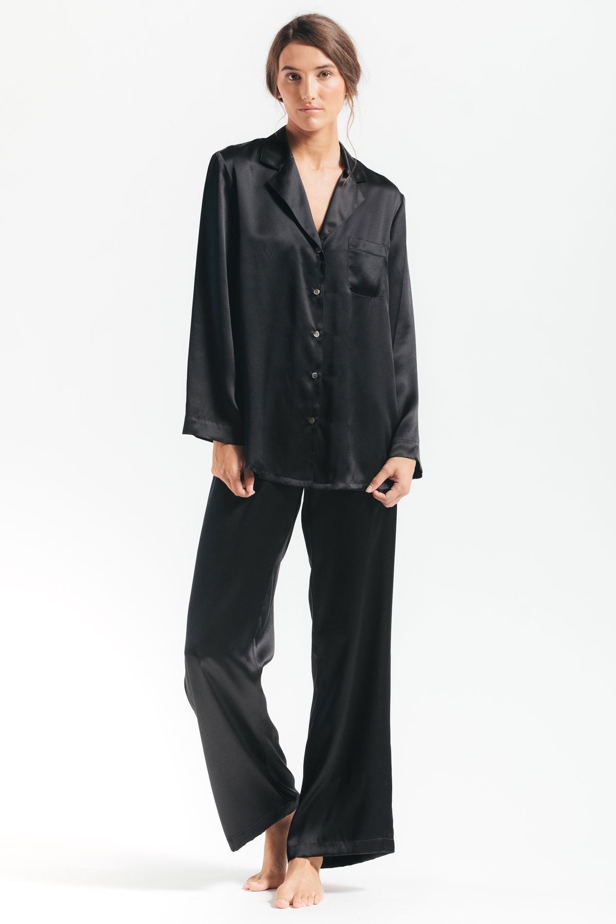 Model wearing Morgan silk pajama set in black