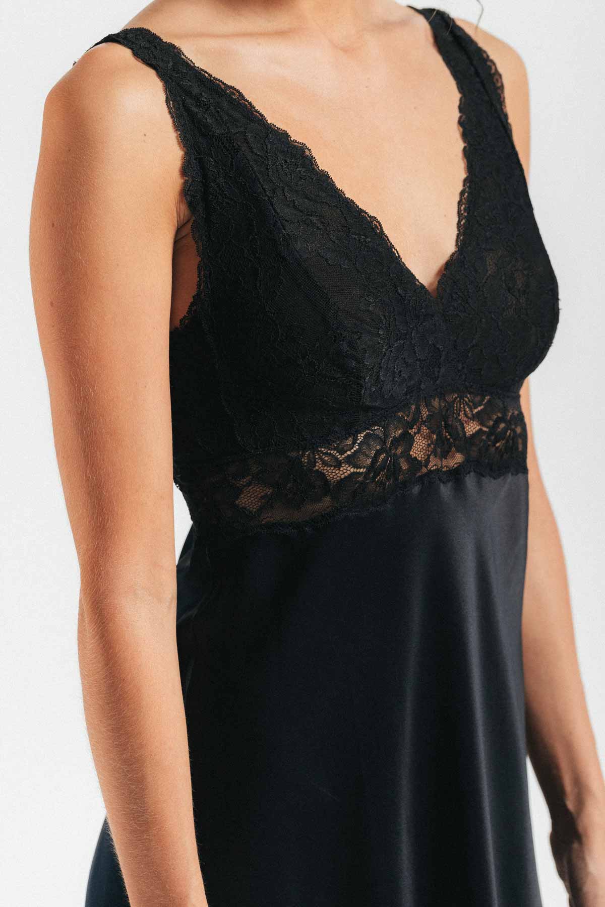 Close-up of front of model wearing Morgan iconic Bust-support black silk gown