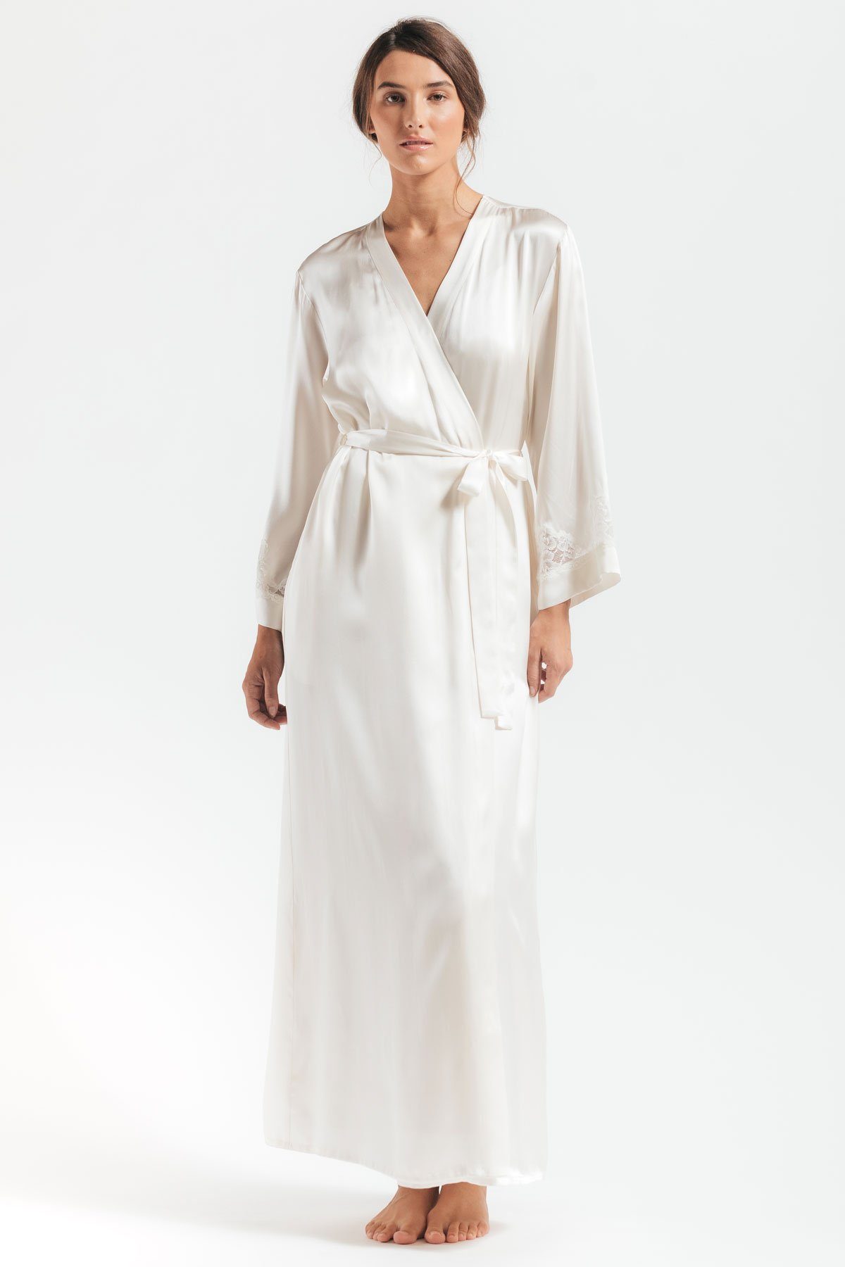 Front of model wearing Morgan Long white silk robe in ivory