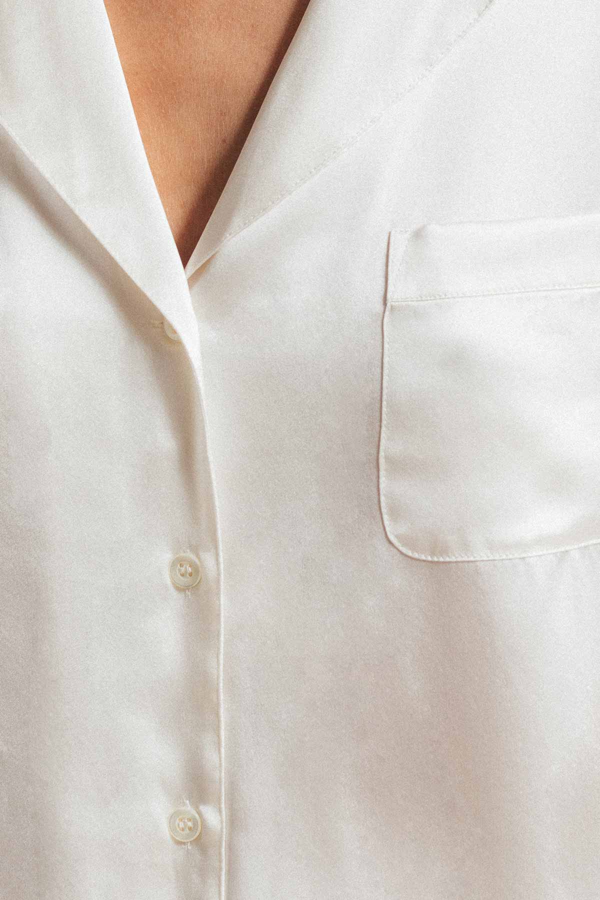 Close up of the top for Morgan silk pajama set in ivory