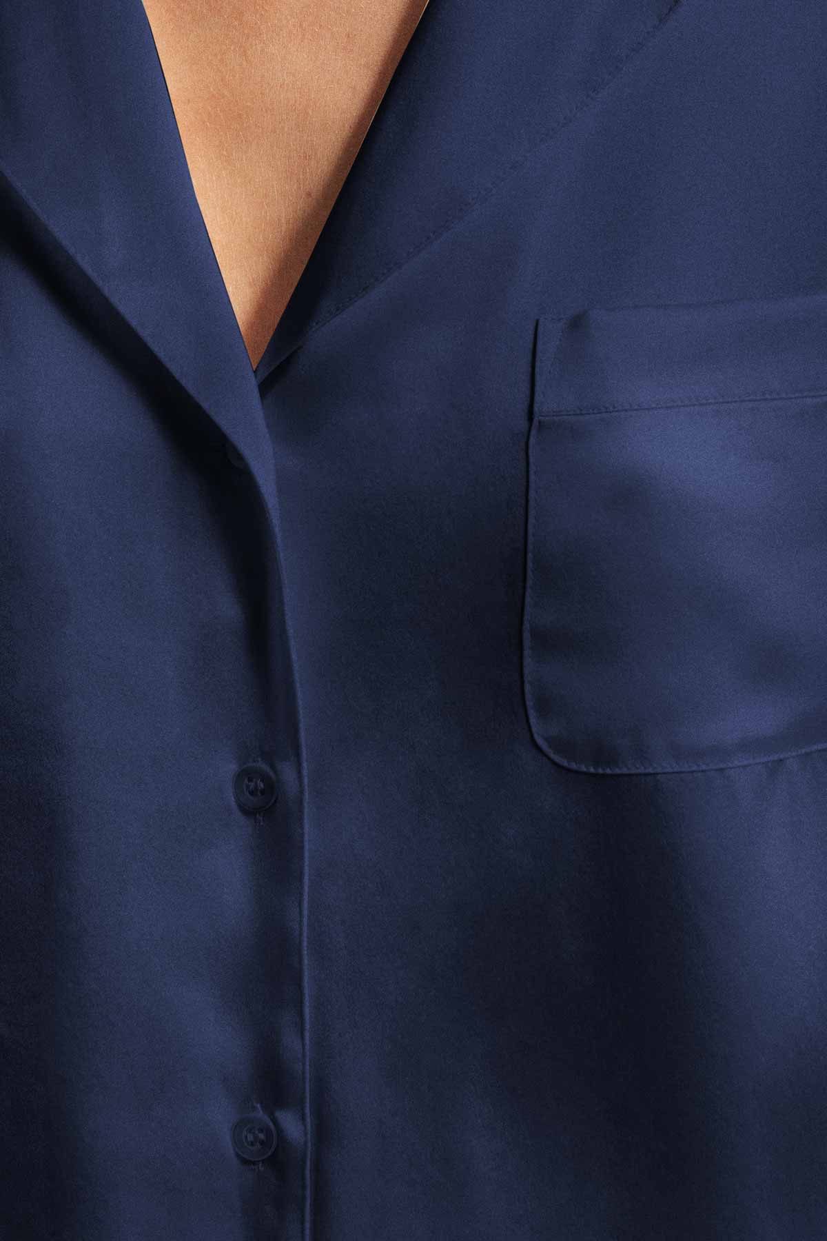 Close up of the shirt for Morgan womens silk pajama set in evening-blue