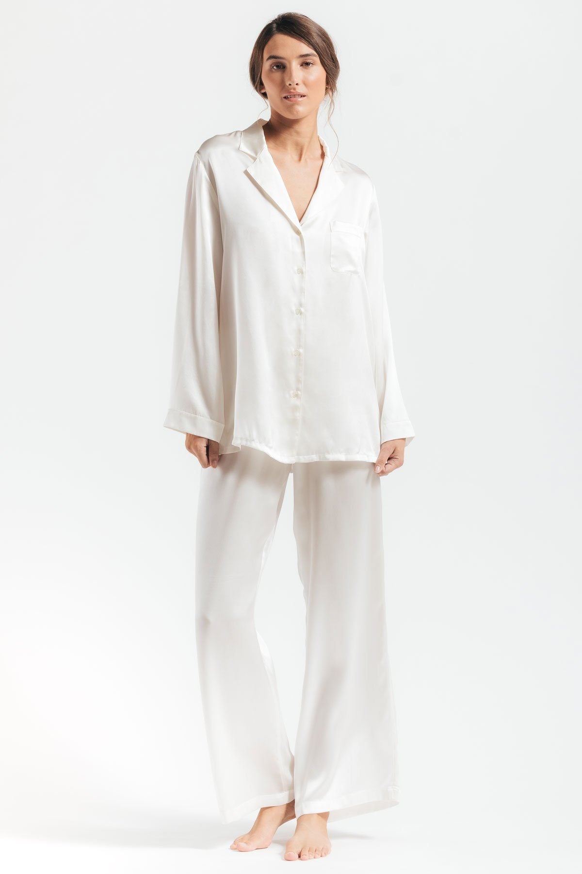 Model showcasing  Morgan Silk pajama set in ivory