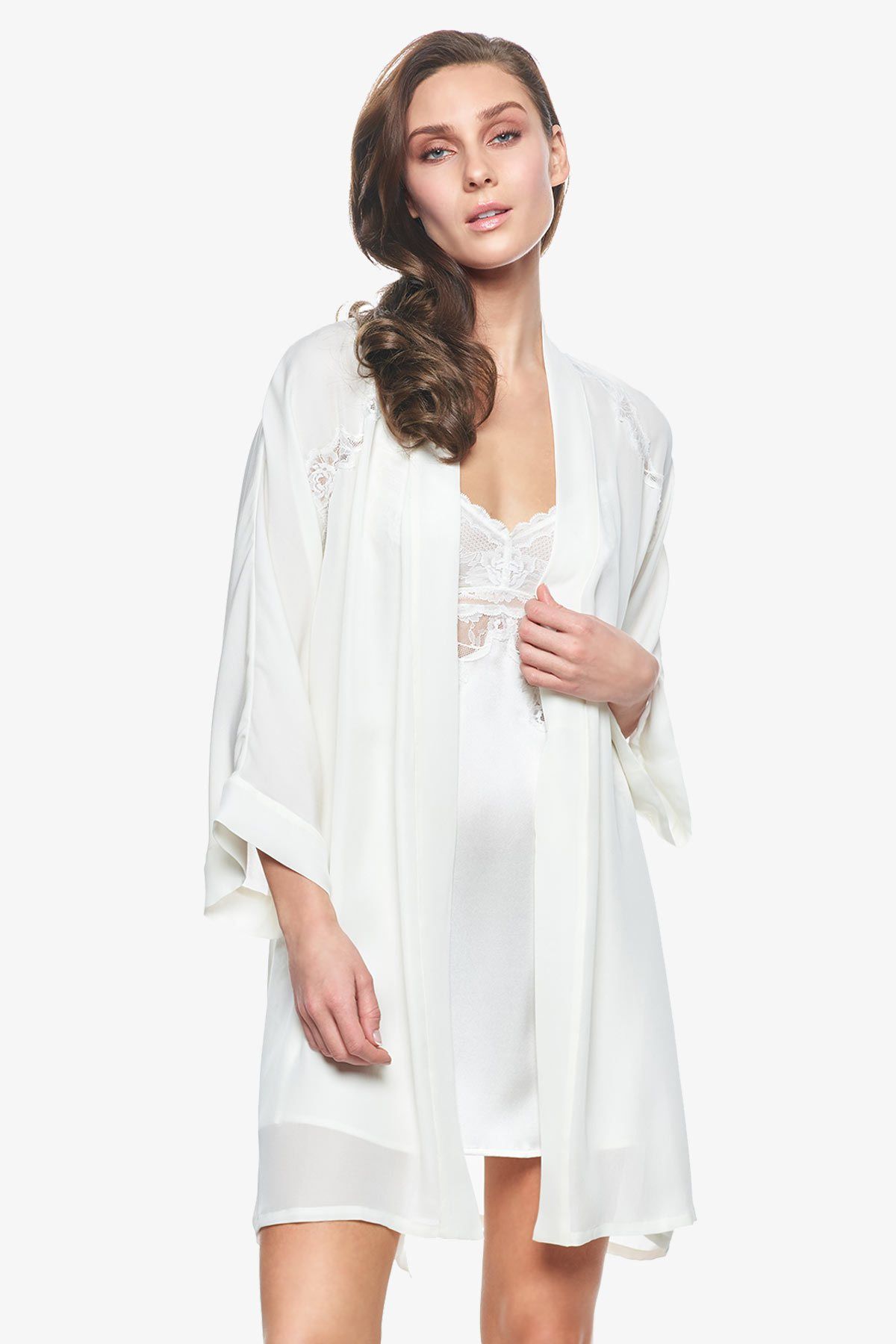 Model wearing Sigrid short bridal robes in pearl-white open