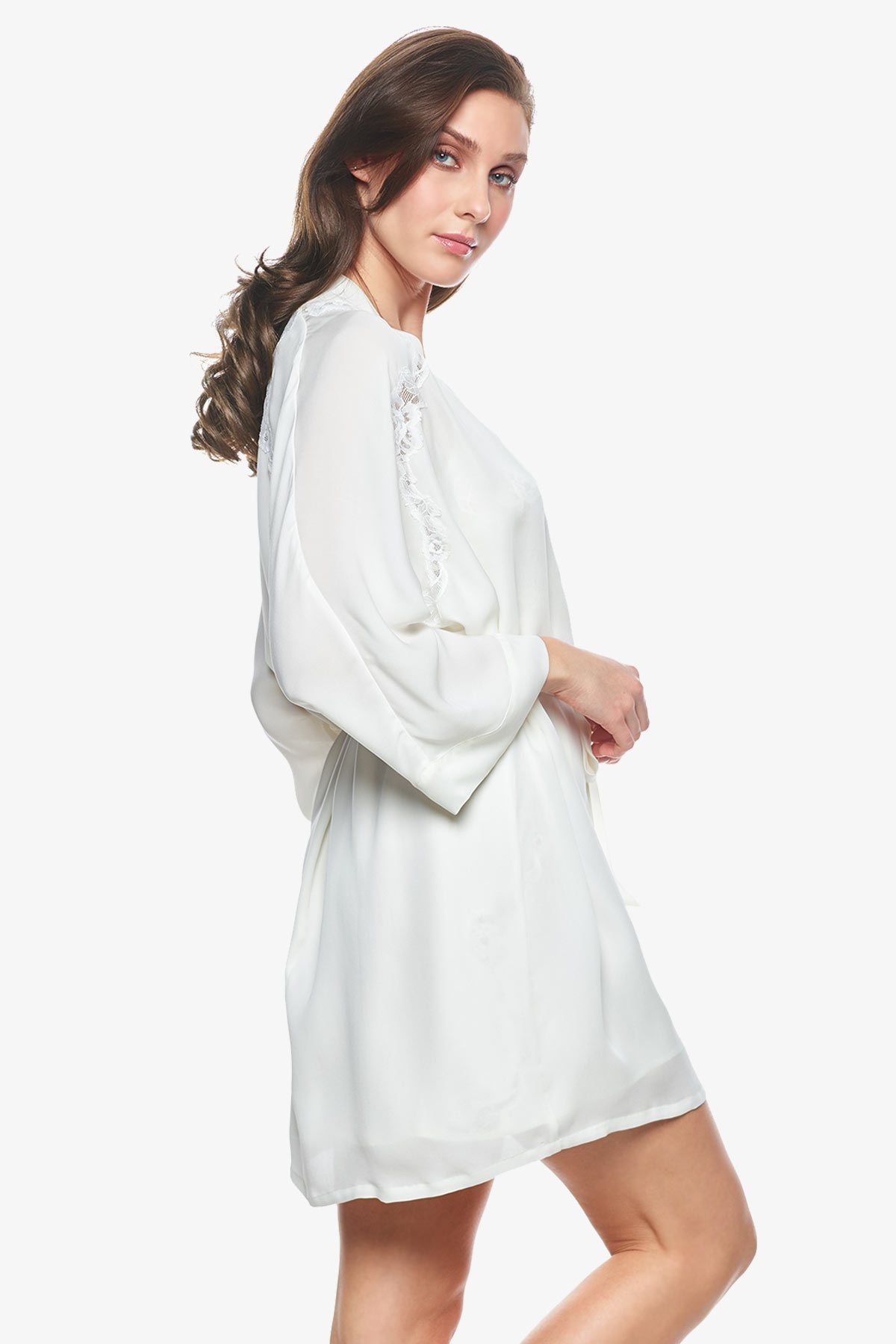 Sideview of model wearing Sigrid short bridal robes in pearl-white
