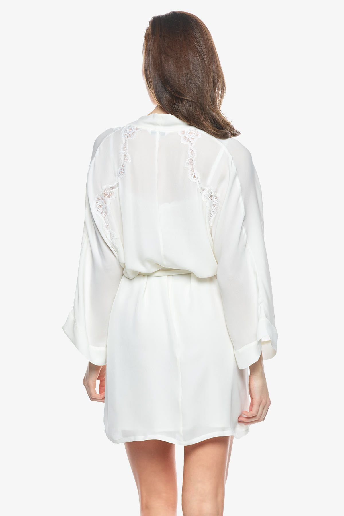 Backview of model wearing Sigrid short bridal robes in pearl-white